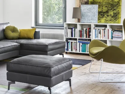 Poltrona Lazy in tessuto con base in metallo di Calligaris